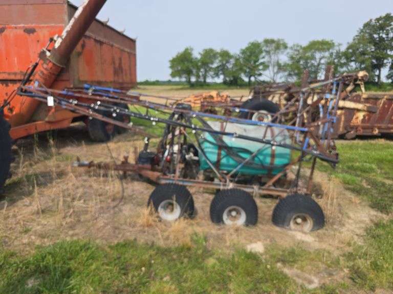 Triple Axel sprayer, pull type.