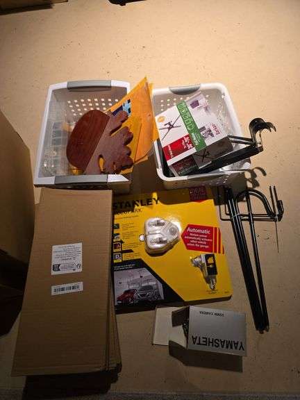 2 car laser parking sys., yellow envelopes, hooks, baskets and misc