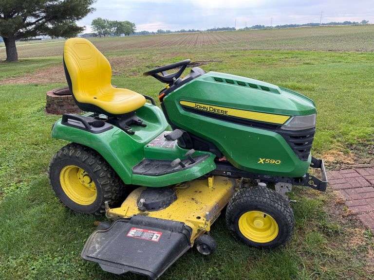 John Deere X590 riding mower 297 hrs. Accel 54" deck, hydro.
