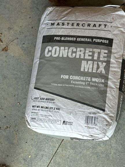4 Bags of North Rock Paving/Leveling Sand and a bag of Concrete Mix