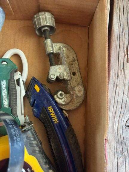 Filter Wrench, tape measure, Exacto knives, and misc