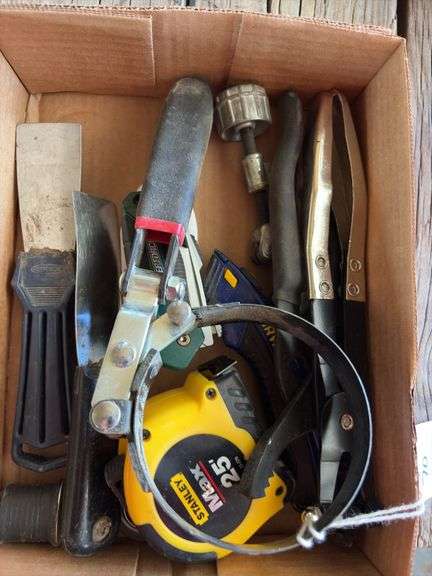 Filter Wrench, tape measure, Exacto knives, and misc