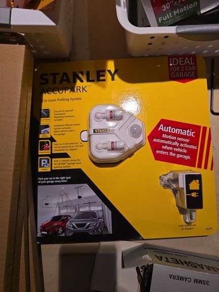 2 car laser parking sys., yellow envelopes, hooks, baskets and misc