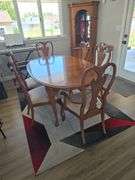Oak oval table with 6 cushioned chairs approx 67" long
