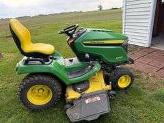 John Deere X590 riding mower 297 hrs. Accel 54" deck, hydro.