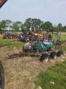 Triple Axel sprayer, pull type.