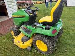 John Deere X590 riding mower 297 hrs. Accel 54" deck, hydro.