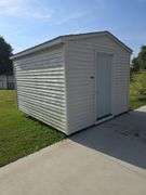 Portable shed 12'3"x10'3" 9' tall, 36"x80" door, on runners, buyers must remove
