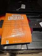 Ukulele with learning book
