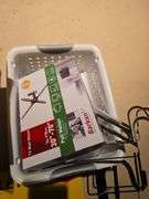 2 car laser parking sys., yellow envelopes, hooks, baskets and misc