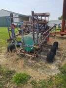 Triple Axel sprayer, pull type.