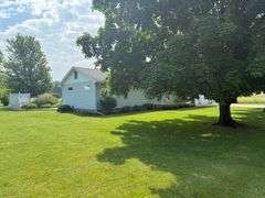 Tract 1• 1280 Sq. Ft. 1 owner home 1 story, 2 bedroom, 1 full bath & a ¾ bath, kitchen, dining room, living room, brick fireplace w/gas log (can burn real wood), 504 square ft. garage & 1250 Sq. Ft. garage w/heat w/heat & drain,  hardwood floors in part of house, sun room, city of Casey utilities, hot water heat, central air, on demand hot water heater, whole house back up generator on natural gas, .614 Acres (6/10’s of an acre) Located in Sec. 20, Casey Township, Clark County, IL (Tract 1 is a by the tract not by the acre. Home was built in 1965. ANYTIME THERE IS A BID ON ANY TRACT WITH LESS THAN 3 MINUTES LEFT,3 MINUTES WILL BE ADDED!