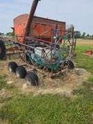 Triple Axel sprayer, pull type.