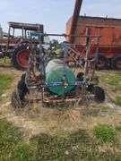 Triple Axel sprayer, pull type.