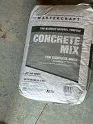 4 Bags of North Rock Paving/Leveling Sand and a bag of Concrete Mix