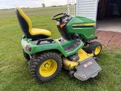 John Deere X590 riding mower 297 hrs. Accel 54" deck, hydro.