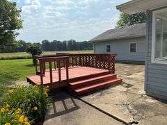 Tract 1• 1280 Sq. Ft. 1 owner home 1 story, 2 bedroom, 1 full bath & a ¾ bath, kitchen, dining room, living room, brick fireplace w/gas log (can burn real wood), 504 square ft. garage & 1250 Sq. Ft. garage w/heat w/heat & drain,  hardwood floors in part of house, sun room, city of Casey utilities, hot water heat, central air, on demand hot water heater, whole house back up generator on natural gas, .614 Acres (6/10’s of an acre) Located in Sec. 20, Casey Township, Clark County, IL (Tract 1 is a by the tract not by the acre. Home was built in 1965. ANYTIME THERE IS A BID ON ANY TRACT WITH LESS THAN 3 MINUTES LEFT,3 MINUTES WILL BE ADDED!
