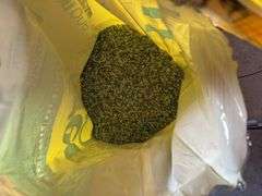 Push Type Fertilizer Spreader with open bag of lawn care