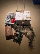 Photo albums, easel, candles, hooks, and misc