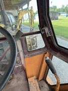 Case 580E Backhoe, 82'' Bucket, 2wd, Out Riggers, 24'' Rear Bucket, 17.5 L-24 Rear Tires, Hour meter is broken s/n 12101943.