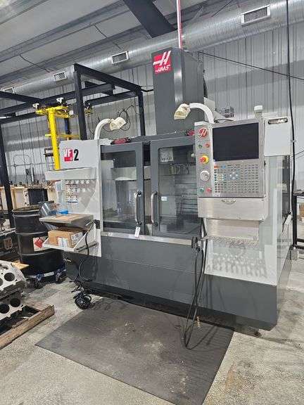 2015 Haas VF-2 Mill, 4th axis wired, High Speed Machining, CAT 40 taper, Chip Auger