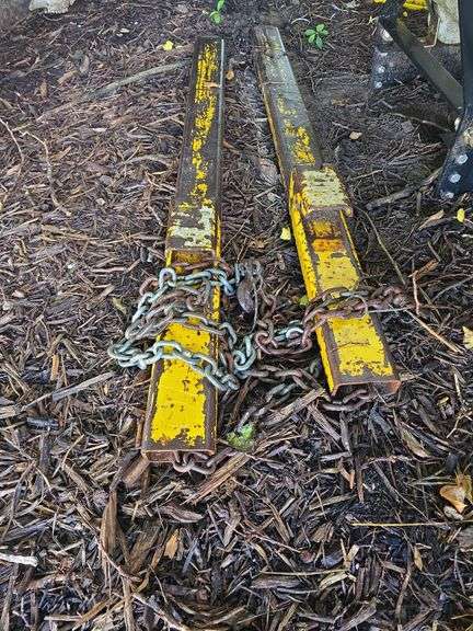 Clamp on bale bucket forks