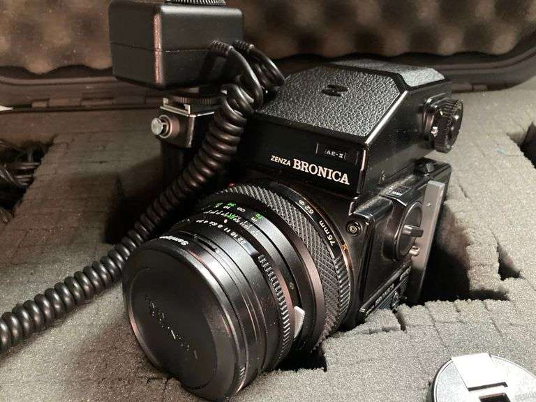 Bronica Medium Format Camera with Numerous Accessories in a hard Shell Case