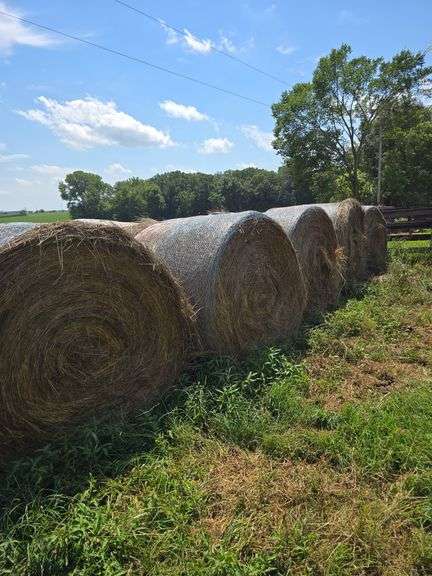 14 round bales of clover and grass hay net wrapped, 5x5.