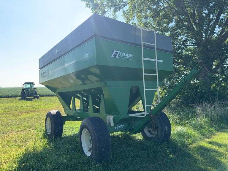 E-Z Trail 500 Gravity Wagon, on 1585 Gear Extendable Tongue, 385/65R22.5 Tires, left hand unload