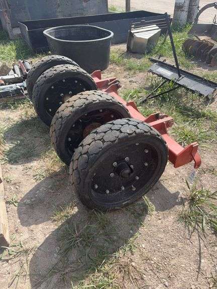 Bush Hog brand tires with framework.