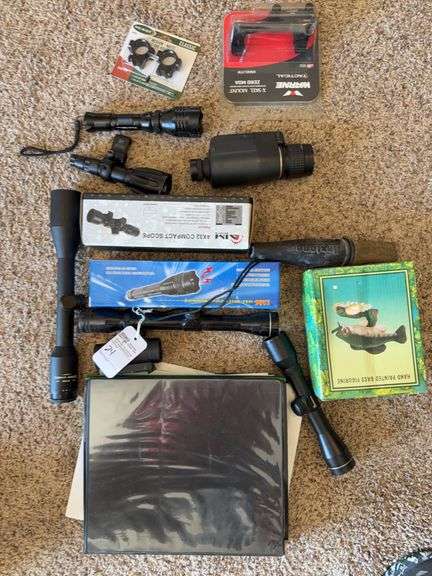 Large Assortment of scopes, and paper shooting targets