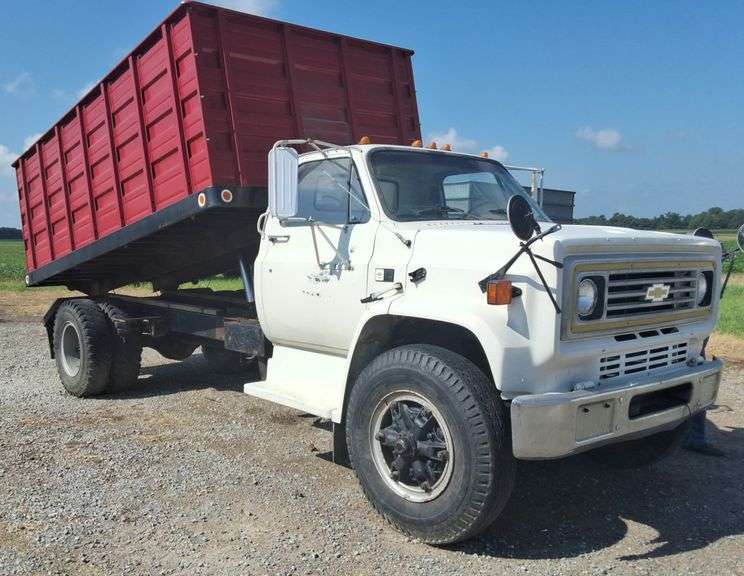 1985 Chevrolet C70 Grain Truck, 427 Engine, Twin Hoist, LP Burner, 52'' Tall sides, 14ft bed, Air Brakes, 5 speed, 96,655 miles, Rear Chute, Wood Floor, VIN- 1GBM7DEXFV108804