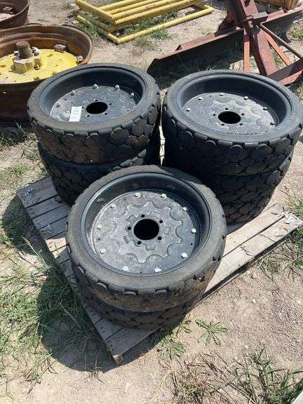 Pallet of Bush Hog brand rims and tires (Quantity 8 one money bid like new)