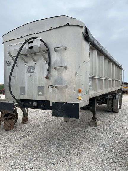 1990 East 28ft Dump Trailer, New Hoist, like new tires, and newer tarp, newer tarp bows, good liner, really good shape for the year, good shape, just downsizing, VIN#1E1D1L284LRE11779