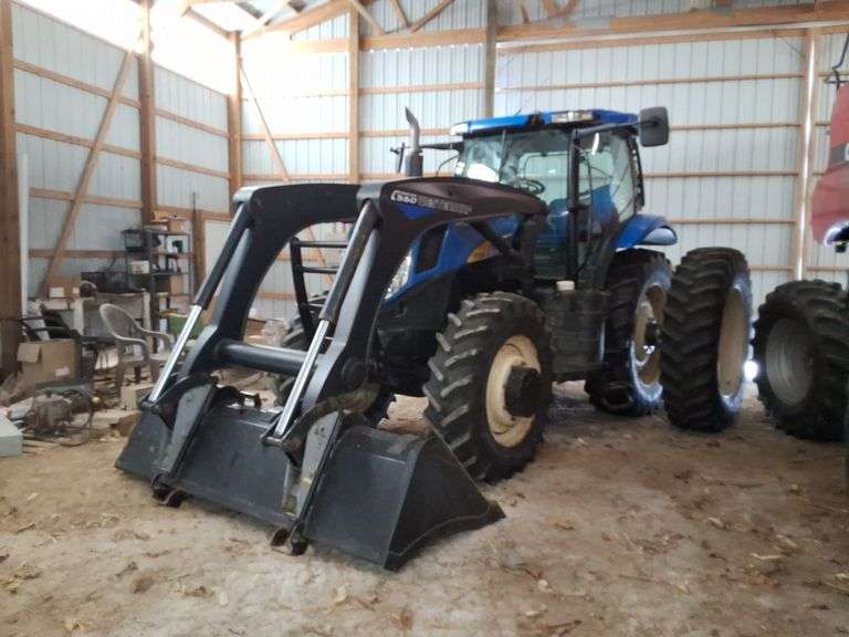 2010 New Holland T7050 tractor with 560 Westendorf loader and bucket, CVT, 31mph, FWA, 2,744 hours, 380/85R30 Front Tires, 195hp, 480/80R42 duals, small 1000pto, 540pto, 3pt, Heat/Ac, was a planting tractor, 1 owner  s/n- ZABG04860.