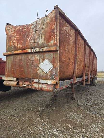 Tall Sided Semi Trailer with steel floor, tandem axle, 8ft sides, 42ft long, steel floor, tires are off the bead, rear end swinging gate