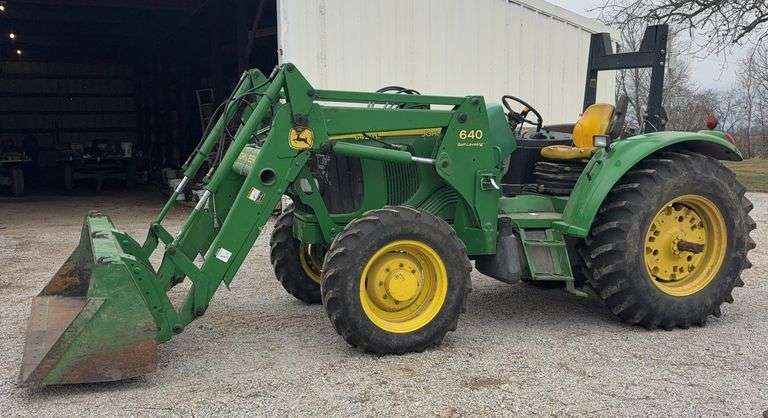 2004 John Deere 6420 L Loader Tractor, with 640 Self Leveling Loader, 2,743 hours, MFWD, Firestone 18.4-30 Rear Tires, 2 Remotes, Firestone 12.4-21 Front Tires, Quad Range, 3pt, 540pto, with loader bucket, s/n- L06420D435529 (When viewing this lot click on documents for a spec sheet) Fluid are in the rear tires.