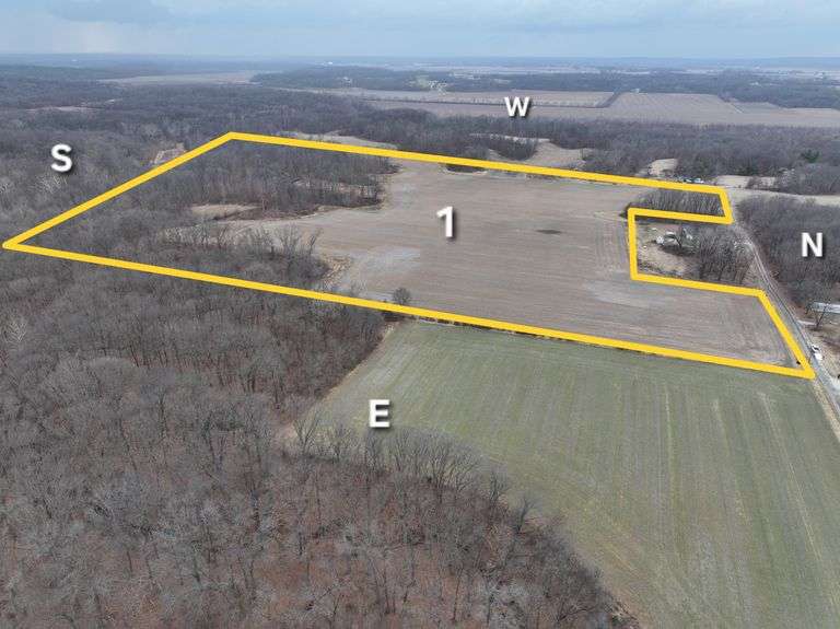 Tract 1: 48.25 + or – acres, 26.42 + or – tillable acres (Soil PI 104.4), 21.83 + or – acres of wooded hunting land. Giant Whitetail Bucks and wild turkey. Property is located in Sec 30, Holland Township, Shelby County, IL.  Both tracts include 8.73 acres enrolled in CRP, with payments of $272.12 per acre. The total annual payment is $2,376, which is divided between tract 1 and tract 2. The USDA will dictate the acreage of CRP that will go with each tract if they are purchased by different buyers.