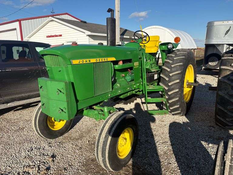 1971 John Deere 4000 Diesel Tractor, 8,300 hours, nice paint and metal, Standard Injection Pump, Nice paint and metal, New Batteries, water pump, and exhaust gaskets, single remote, synchro shift, 18.4-34 Firestone Rear Tires, double stack rails and front weights, New seat , s/n- B213R-257218R