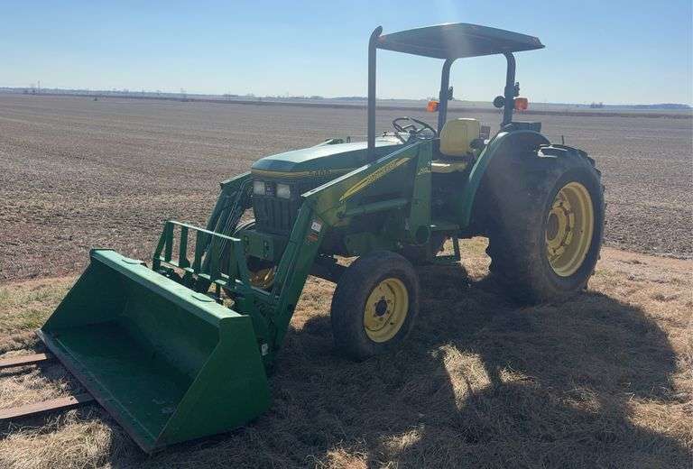 1996 John Deere 5400 Loader Tractor with pallet forks and loader bucket, 3,151 hours, 9/3 TSS transimission,16.9-30 Rear Tires, Quick Hitch, 540pto. Dual SCV's w/joystick control,A, B, C, - 1,2,3, Canopy, 2wd, Rear Wheel Weights, John Deere 512 Loader, s/n- LV9400E541746 (When viewing this lot click on documents for a spec sheet)