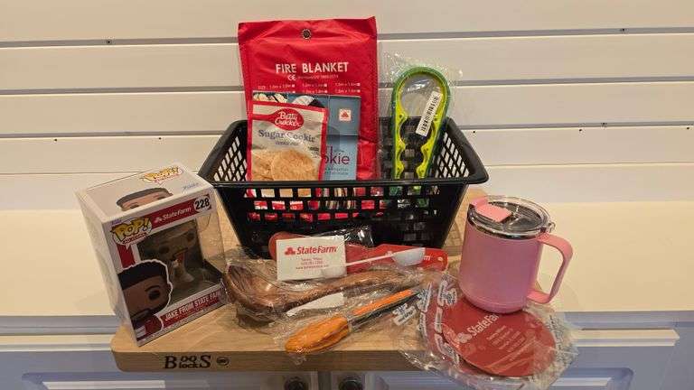 John Boos Maple Wood Cutting Board, Wooden Ladle, Fire blanket, 2 Magic Hand Grips, Jake From State Farm Funko POP, Cookie Scoop, Handheld Jar Opener, Icing Spatula,  16oz Insulated Coffee Mug, Measure Equivelant Metal Magnet, 2 sided Measuring Spoon, Locking Silicone Tongs, Travel Sewing Kit, Sugar Cookie Cookie Mix, The Art of The Cookie Recipe Book - Donated by Tammy Wilson - State Farm Insurance (Valued at $150)