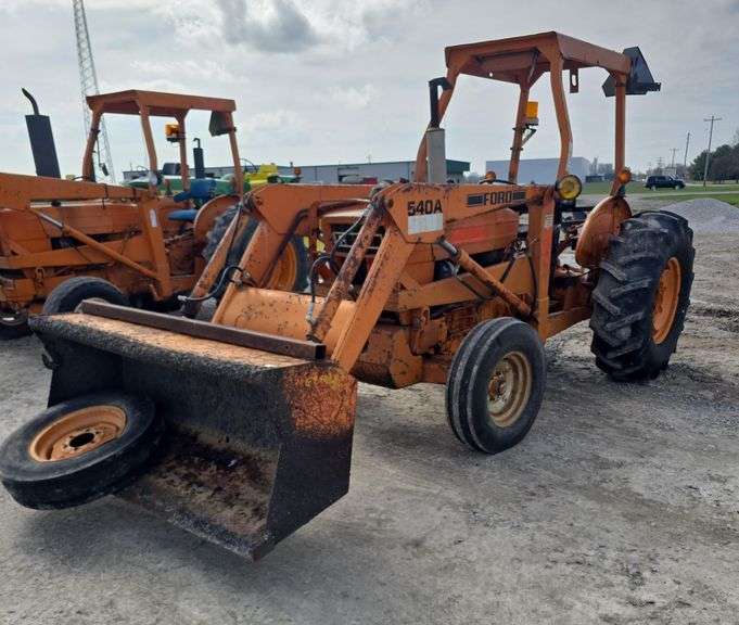 1982 Ford 540 A Diesel Industrial Tractor with loader, 3,582 on old hour meter, 1,847 on new hour meter, brand new 16.9-24 rear tires, 2 outside wheel weights, 3 inside wheel weights, 540 pto, runs and drives, s/n C691879.