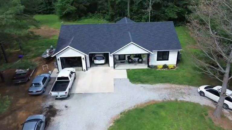 No Reserve Auction Online Only 1404 Sq. Ft. Home, 3 cabins, 40 acres border the Shawnee National Forest at a corner.