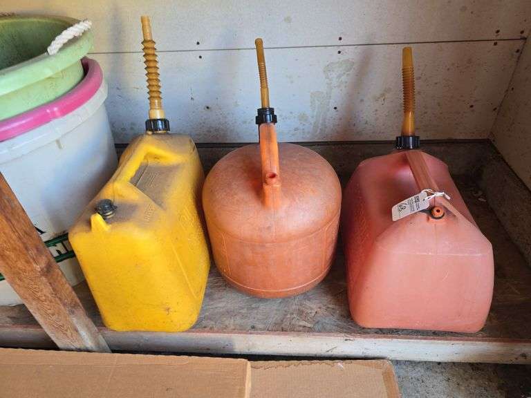 3 fuel jugs and 3 tubs.