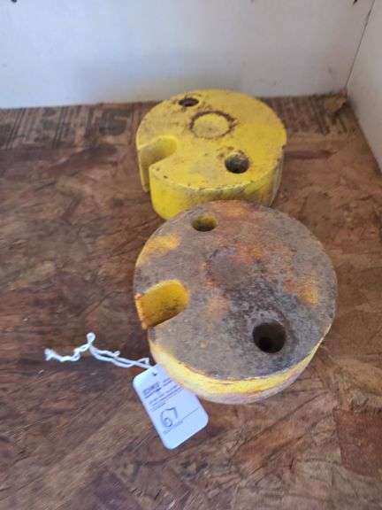 2 Lawnmower wheel weights.