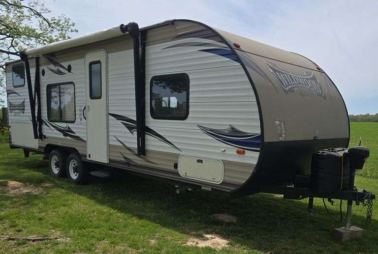 2016 Wildwood X-Lite 261BHXL bumper hitch camper, Was used last summer, VIN# 4X4TWDB20G7350600, 26FT Long, cargo rack, 30 amp hookup, electric awning, hardwood floor, electric jack, stove, microwave, fridge, electric jack, 30 amp hookup, spare tire, couch, bunk beds, bathroom with shower, sleeps 6-8 people, stereo, water heater, nice condition