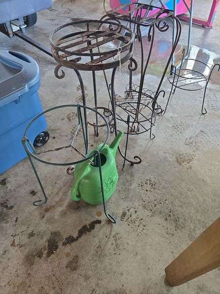 plant stands and watering jug.