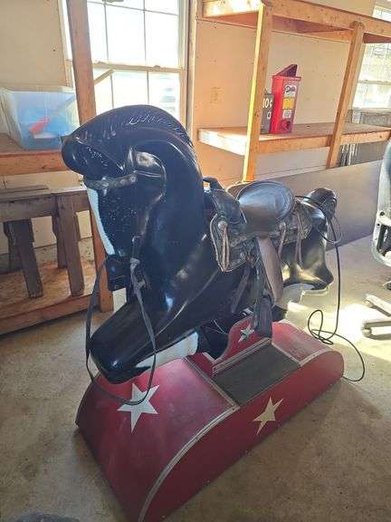 Vintage child’s horse electric.