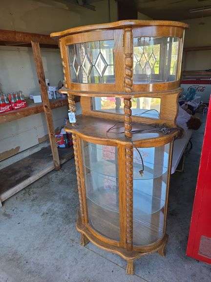 Oak curio cabinet.