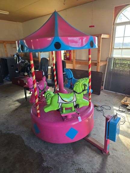 1960’s or 70’s coin operated 3 horse vintage carousel nostalgic memorabilia, plugged in in and it works.